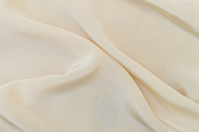 Balm and cream textures side by side in soft neutral light, format comparison.