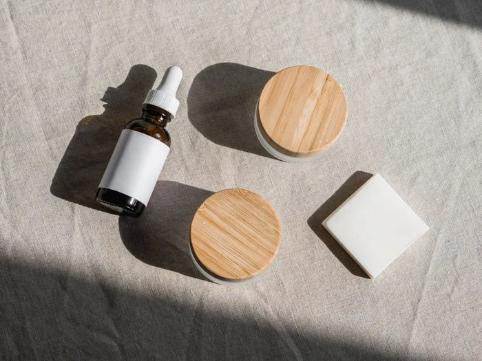 Neutral skincare flat lay on linen, a simple tallow routine.