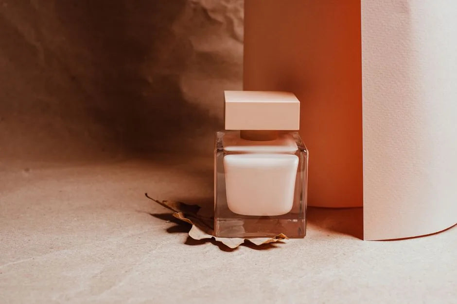 Minimalist cosmetic jar in warm neutral light, tallow skincare.