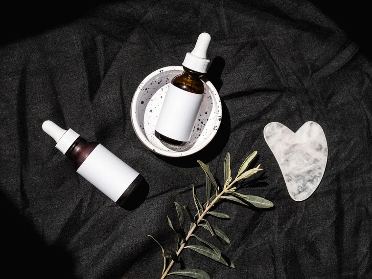 Botanical facial-oil bottle in soft neutral light, natural plant oils comparison.