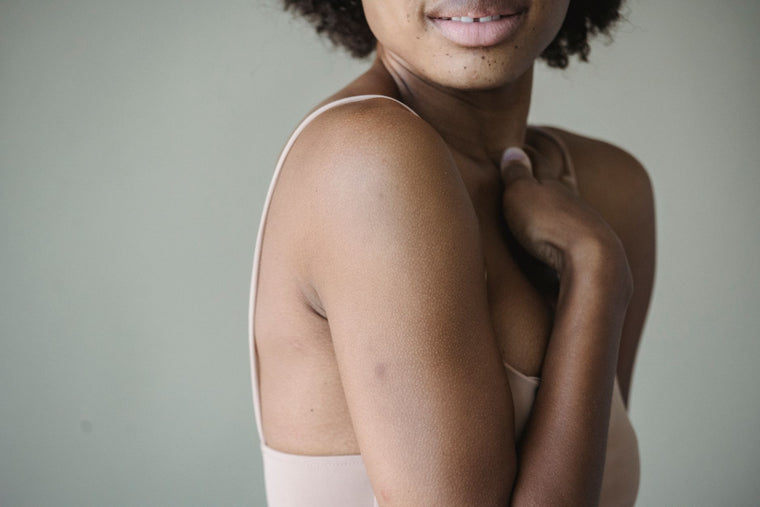 Soft natural light across calm skin, gentle long-term care mood.