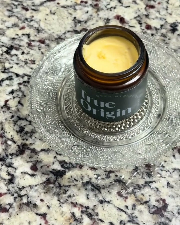 Close up of the whipped tallow texture inside an open Deep Hydration Whip jar