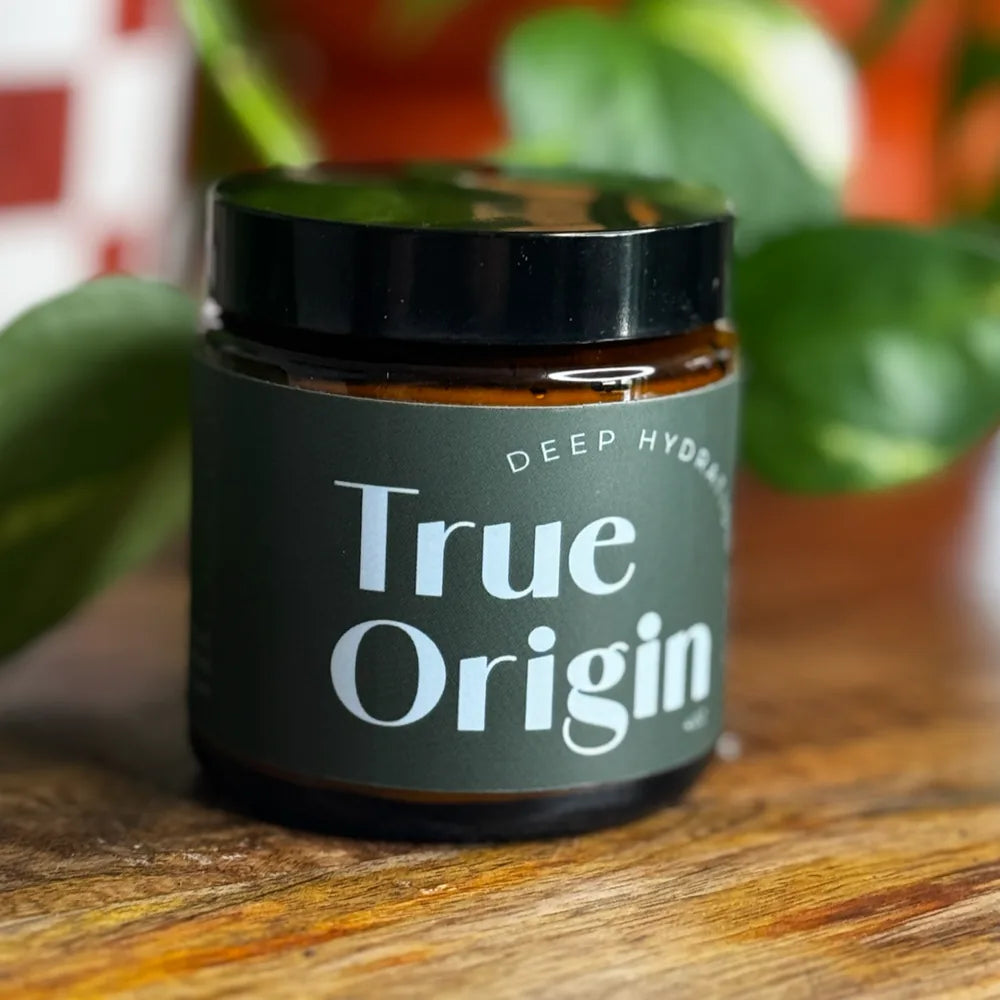 Deep Hydration Whip tallow moisturizer, open jar showing the whipped texture.